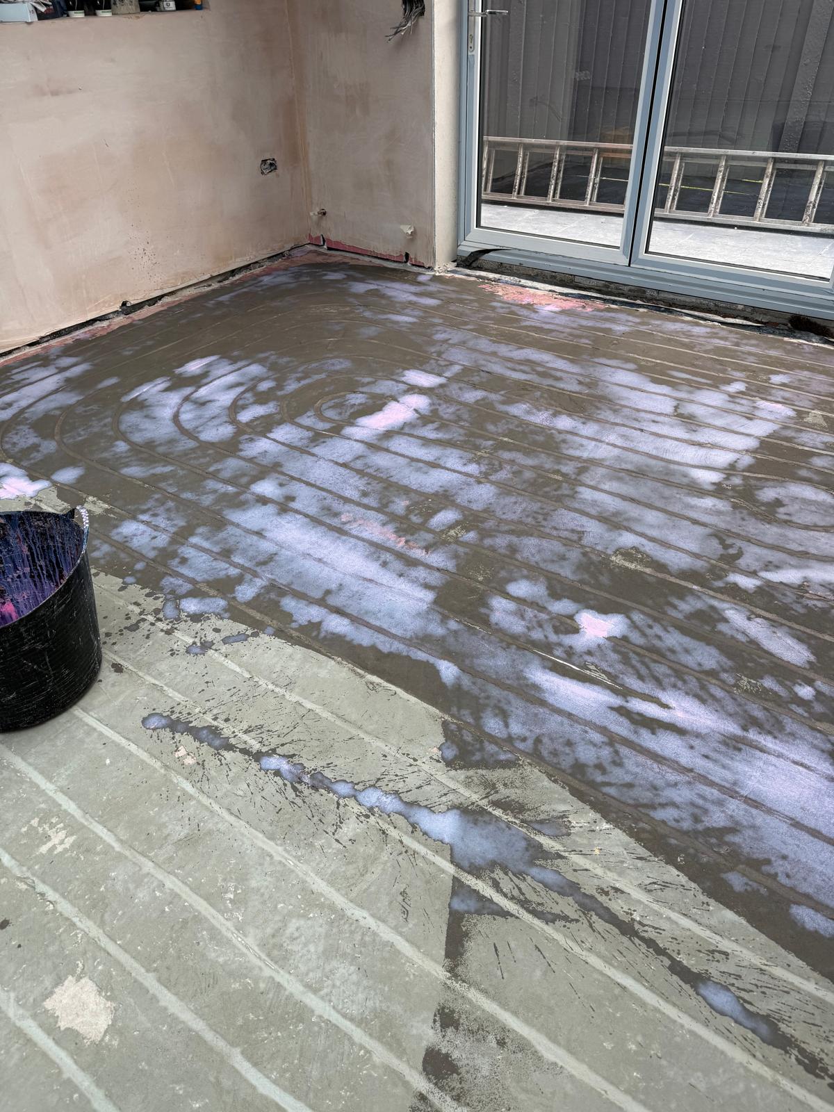 15mm low-profile overlay panel UFH system installed over an existing timber floor